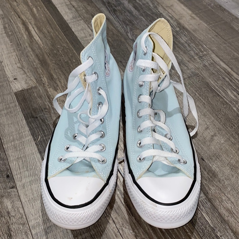 Light blue high top converse